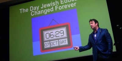 David standing in front of a projector with a countdown